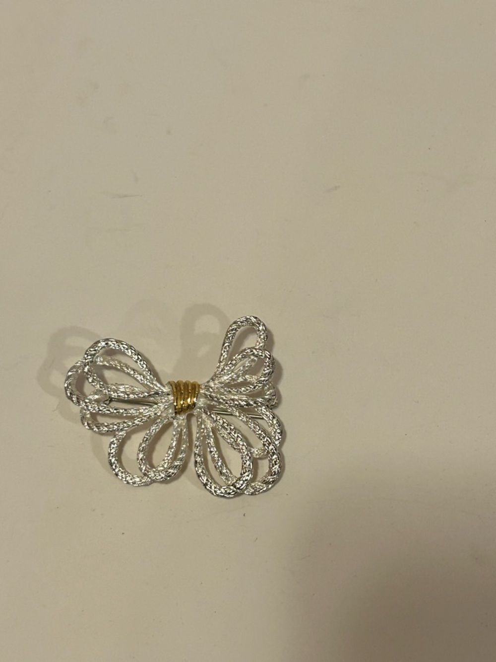 Silver tone Bow Statement Brooch with Gold tone Accent
